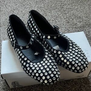 Stylish Black Shoes with Silver Accents